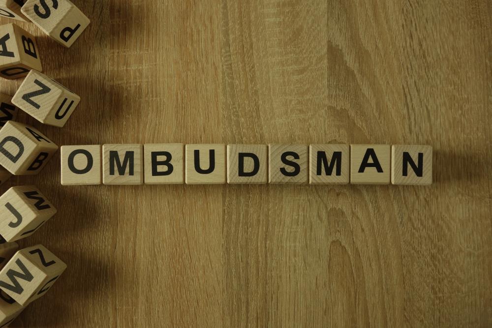 Ombudsman spelled with scrabble blocks